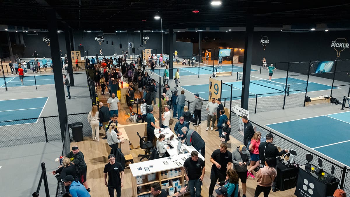 Aerial view of 11 dedicated indoor pickleball courts at The Picklr Tucson