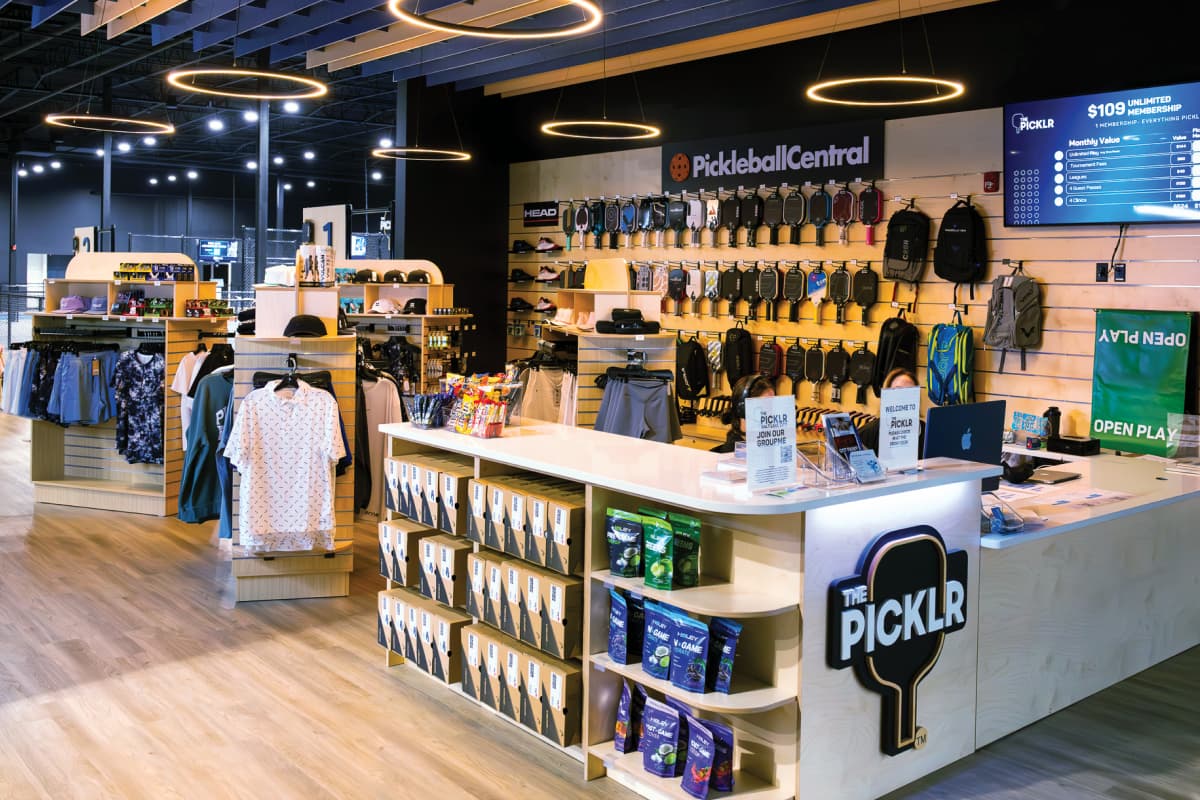 In-club pro shop with paddles and apparel